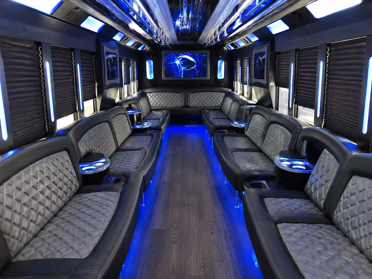 Group beside a Mercedes Sprinter limo in Winston-Salem