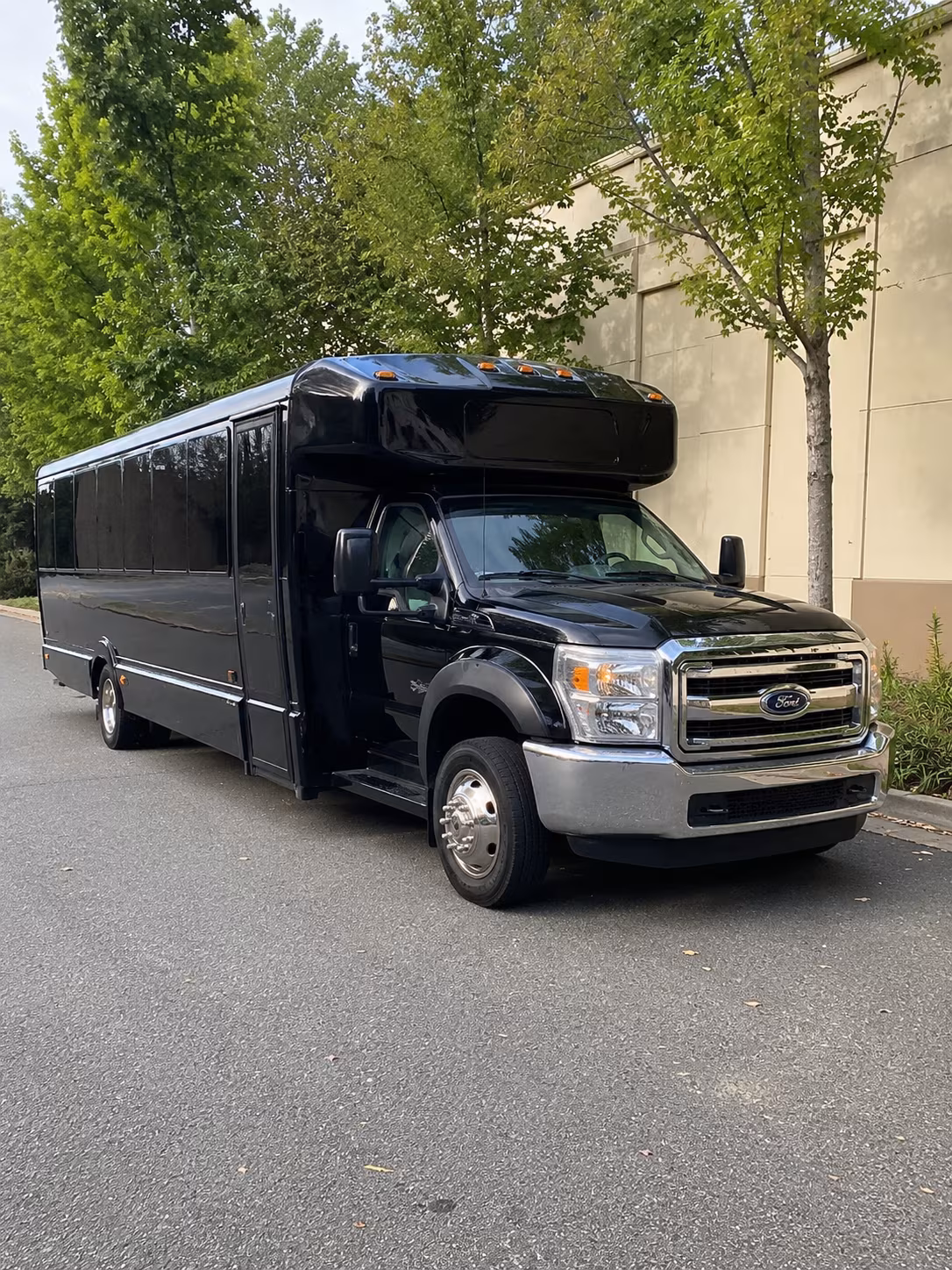Wedding guests seated inside a party bus serving Winston-Salem